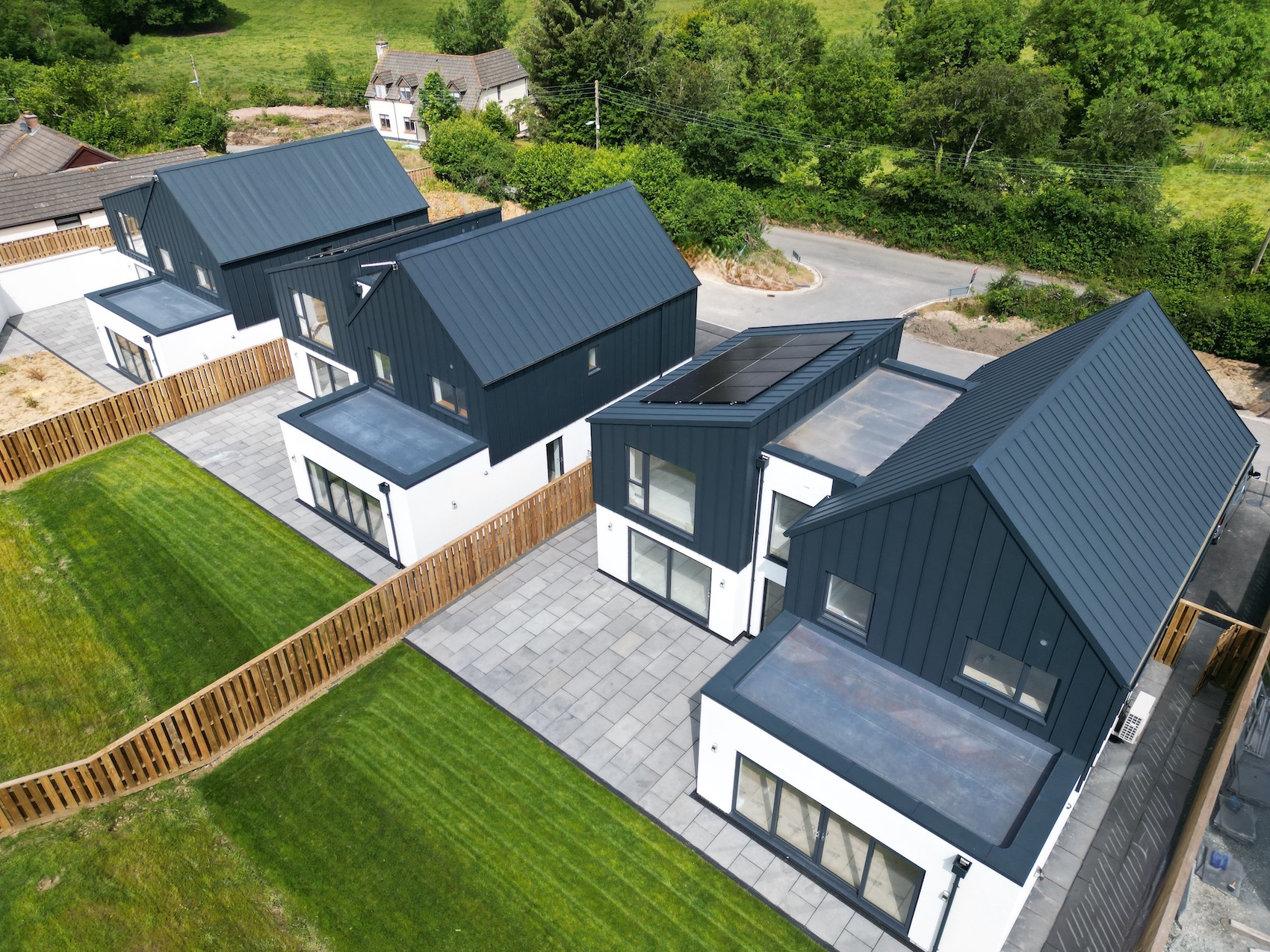 PREFA’s PREFALZ aluminium roofing and cladding in P.10 anthracite was specified for this residential development in Bridgerule, Devon, (photo: PREFA).